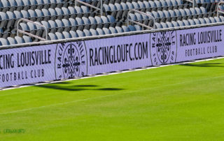 Racing Louisville logo on the animated sideline advertisements